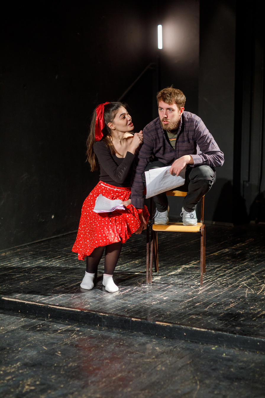 Drama Students Reading A Script In Acting Class